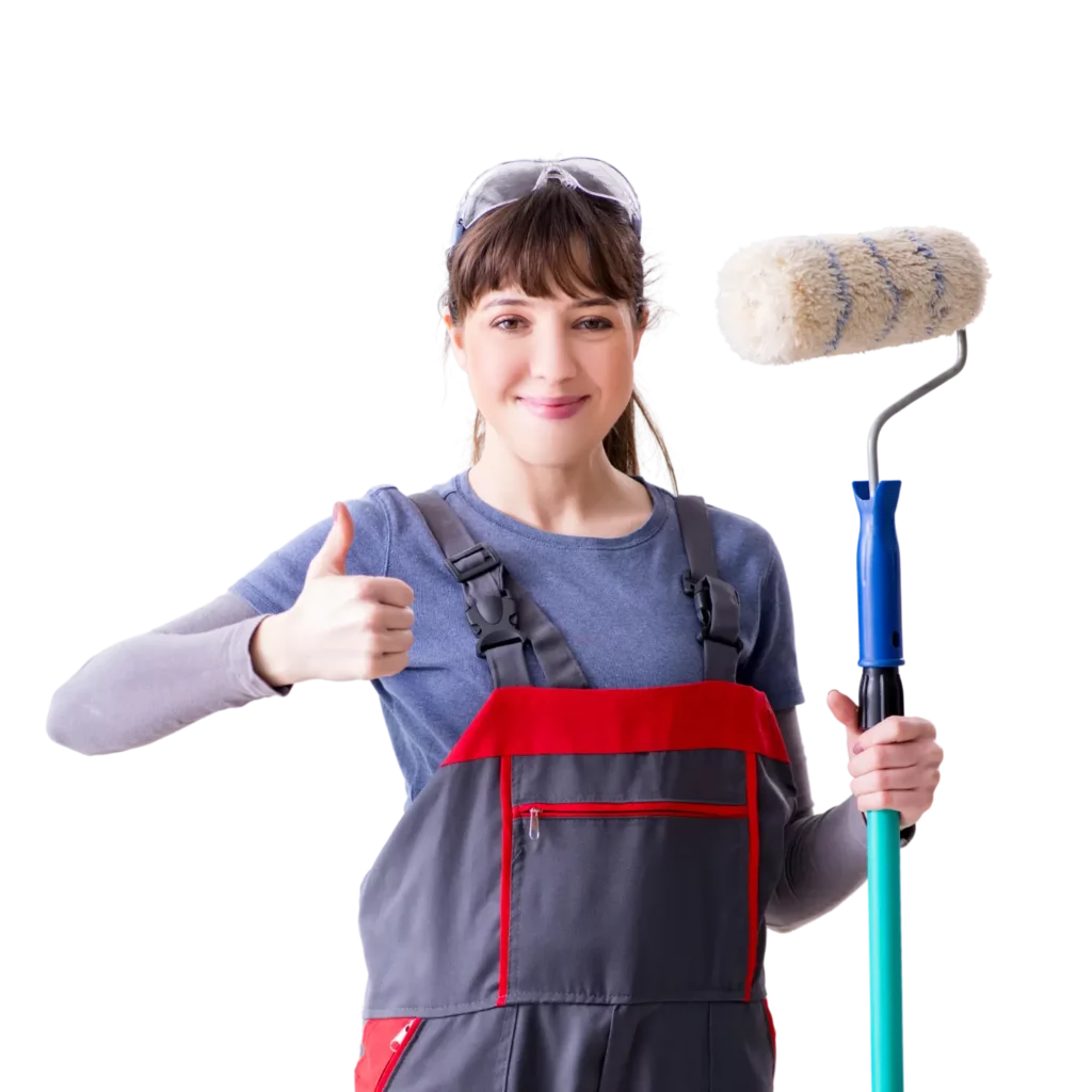 Une femme artisan dans la peinture, de face, tenant un rouleau pour peindre dans sa main gauche.